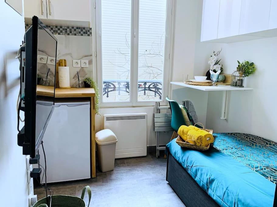 Apartment Le Mini Nook - Metro 9 Robespierre Porte De Paris *